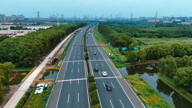 Backward Aerial View of Traffic on a Highway in Shanghai