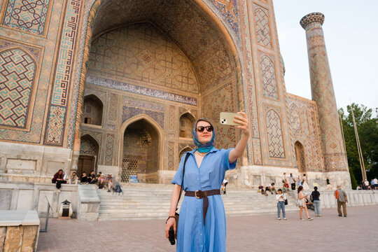 Woman Takes Selfie In Registan Square, Samarkand, Uzbekistan