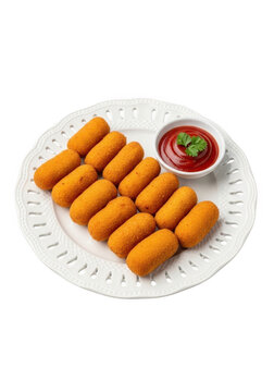 Crispy golden fried potato croquettes served on a decorative plate with fresh red ketchup isolated on transparent background