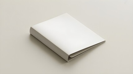 Fototapeta premium Closed blank book mockup with soft shadows on a neutral beige background