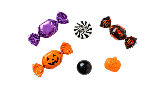Assorted halloween candies and sweets isolated on transparent background