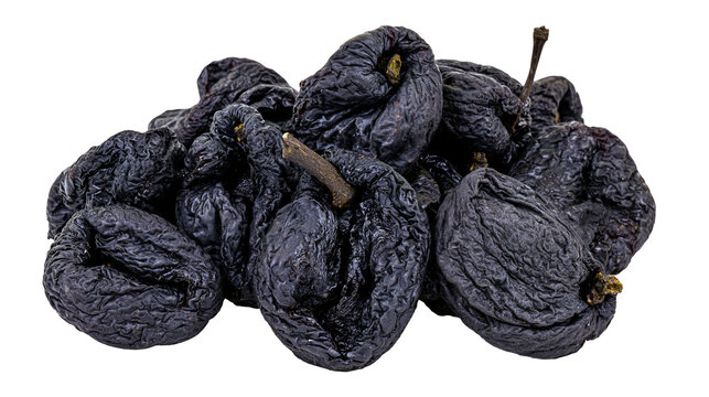 Dark wrinkled prunes with stems, isolated on transparent background