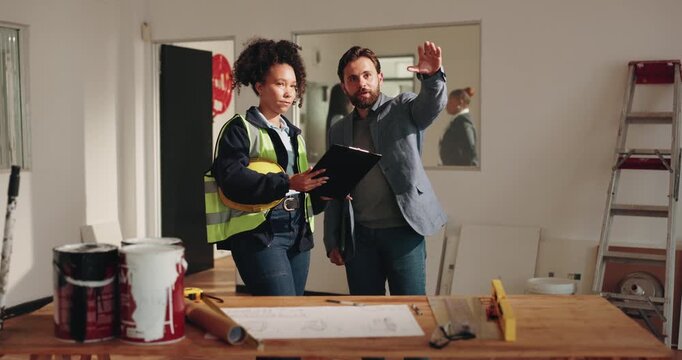Architect, clipboard and talk on site with project manager, check construction timeline and design. Architecture, team and people in commercial building with conversation, planning and checklist.
