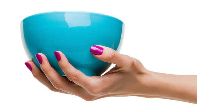 Woman s hand with magenta nails holding a turquoise bowl, isolated on transparent background