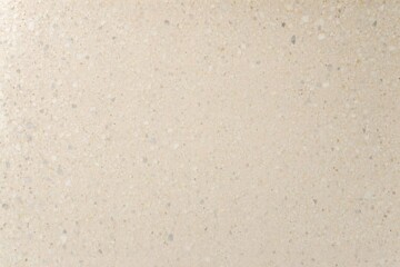Obraz premium Speckled terrazzo countertop with tactile grain and sheen - Close composition emphasizing micro‑pitting, aggregate edges, and reflective polish of a warm terrazzo surface.