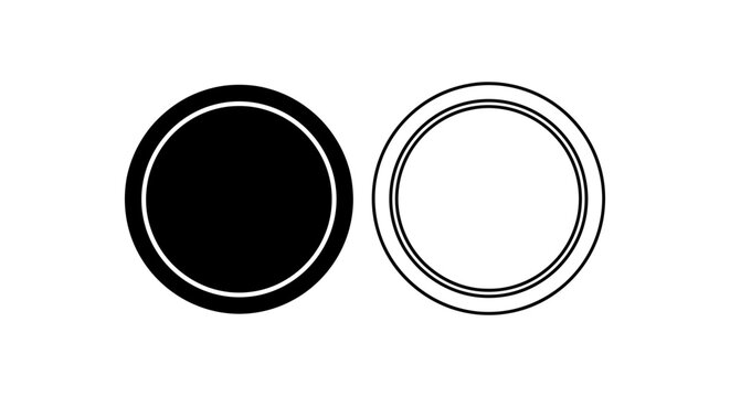 Two circular objects one solid black and one outlined on a white background silhouette
