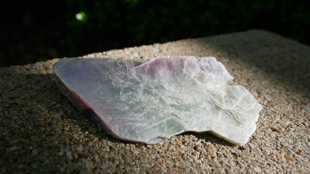 Silver Muscovite with Pink Lepidolite Crystal on Natural Background