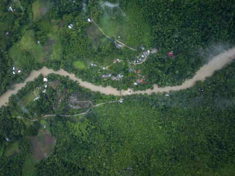 Aerial view of the lush jungle landscape surrounding the Cahabon River near Semuc Champey with dense vegetation in San Agustin Lanquin, Alta Verapaz Department, Guatemala.