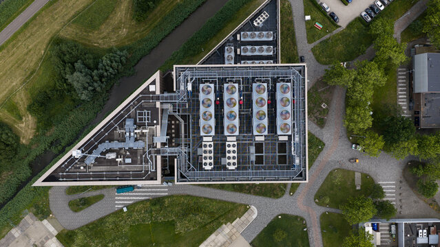 Aerial view of the Digital Realty Amsterdam AMS17 data center, featuring rooftop cooling units and industrial infrastructure in Amsterdam, Noord-Holland, Netherlands.