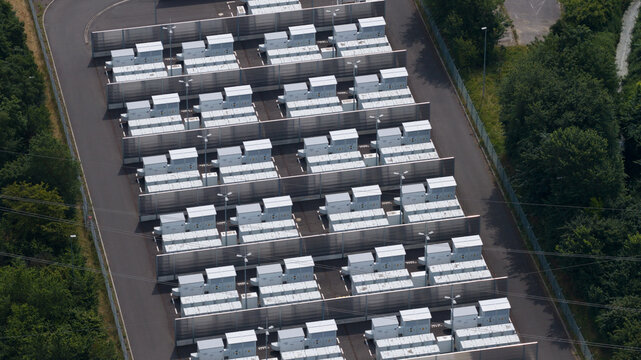 Aerial view of Battery Energy Storage Park Beside Traditional Power Plant