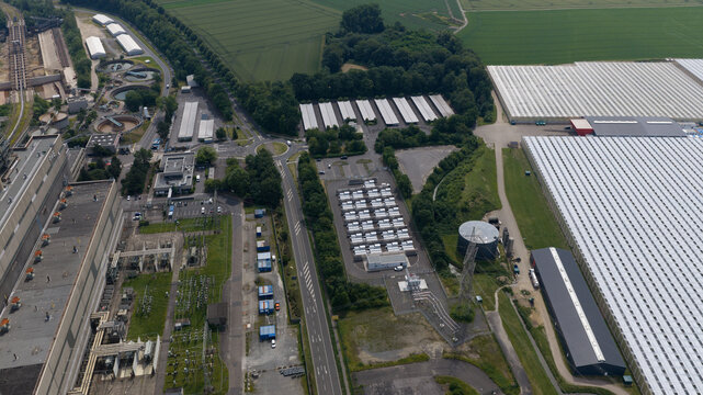 Aerial view of Battery Energy Storage Park Beside Traditional Power Plant