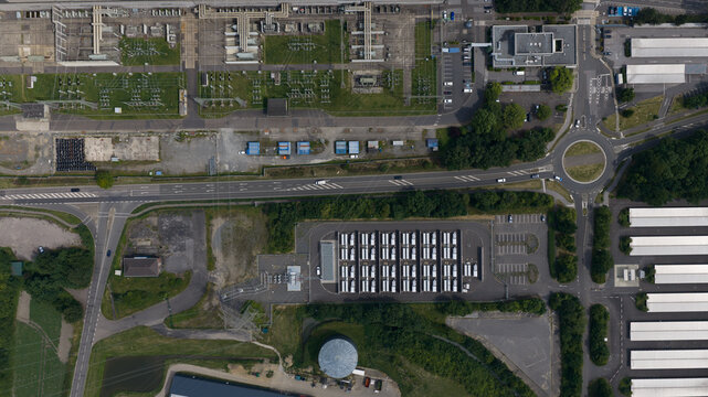 Aerial view of Battery Energy Storage Park Beside Traditional Power Plant