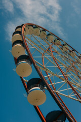 ferris wheel on a blue sky © Anton