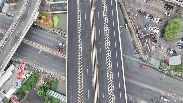 Aerial view of the elevated highway and intersection in Bekasi Barat, West Java, Indonesia.