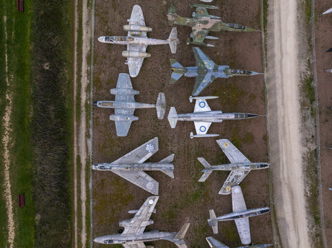 Aerial view of the Chateau de Savigny-les-Beaune, showcasing vintage fighter jets on the grounds in Savigny-les-Beaune, Bourgogne-Franche-Comte, France.