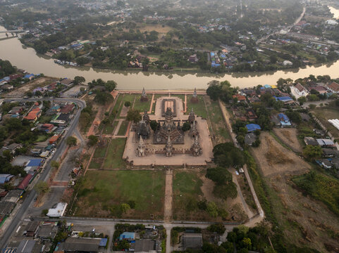 Aerial view of Wat Chaiwatthanaram, an ancient Buddhist temple complex with a central prang and surrounding chedis, located in Tambon Ban Pom, Chang Wat Phra Nakhon, Thailand.