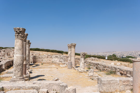 View of Amman Citadel featuring ancient stone columns and ruins under a clear blue sky in Amman, Amman Governorate, Jordan.