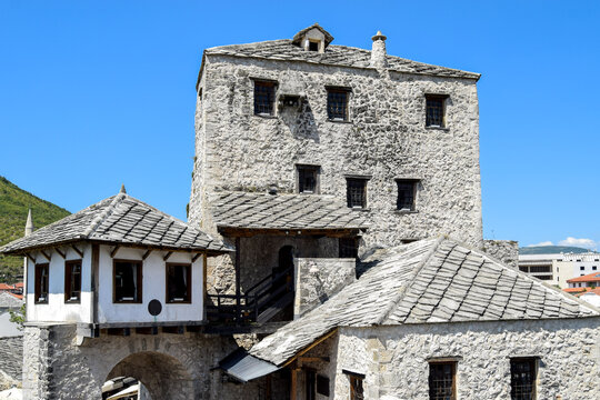 View of the historic Halebija Tower in the old town, featuring traditional stone masonry and slate roofs in Mostar, Federation of Bosnia, Bosnia and Herzegovina.