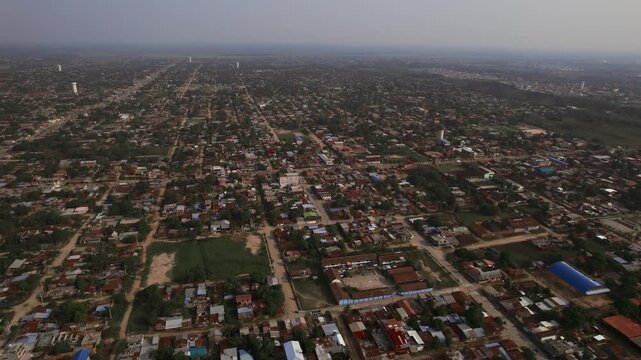 Aerial view of the urban sprawl of Pucallpa with residential rooftops and streets Pucallpa, Ucayali, Peru.