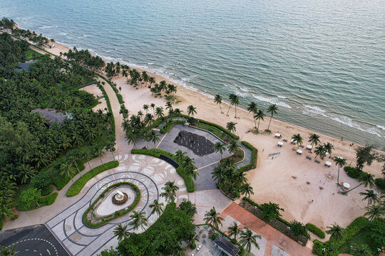 Aerial view of the beach plaza at Long Beach with a fountain, palm trees, sandy beach, and the ocean in Phu Quoc, Kien Giang, Vietnam.