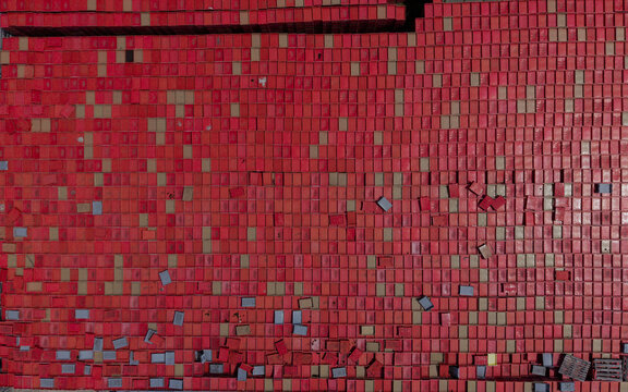 Aerial view of red plastic crates arranged in a grid pattern at Oud-Wulven in Houten, Utrecht, Netherlands.