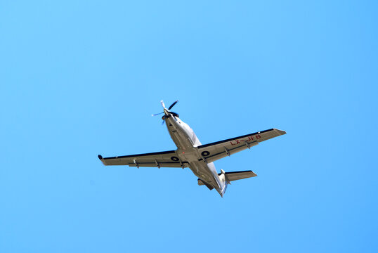 Private airplane type Pilatus PC-12 NG registration LX-JFB taking off from Swiss Z&uuml;rich Airpot on a sunny summer day. Photo taken August 4th, 2026, R&uuml;mlang, Switzerland.