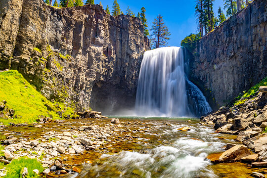 Rainbow Falls dropping over volcanic cliff into pool at Devils Postpile National Monument California