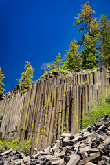 Fototapeta premium Columnar basalt rock formation and talus slope at Devils Postpile National Monument California