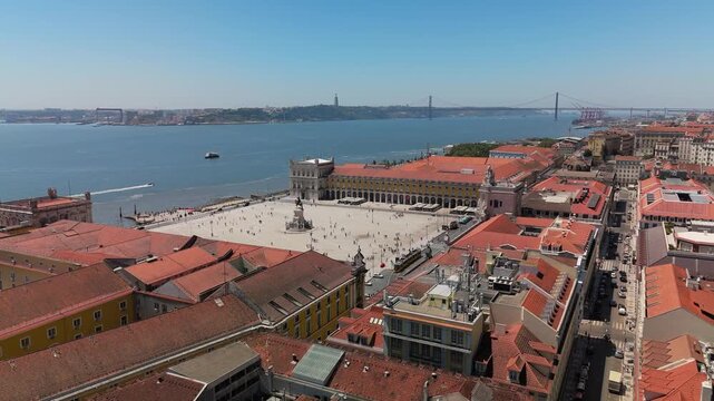 Aerial view of Praca do Comercio with historic buildings and the Tagus River in Lisbon, Portugal.