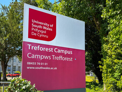 Treforest, Rhondda Cynon Taf, Wales, UK - 14 July 2026: Sign outside the entrance to the Treforest campus of the University of South Wales.