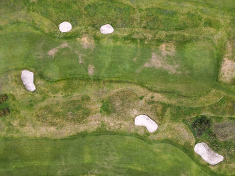 Aerial view of the golf course at Bull Island with sand bunkers and green fairways in Dublin, County Dublin, Ireland.