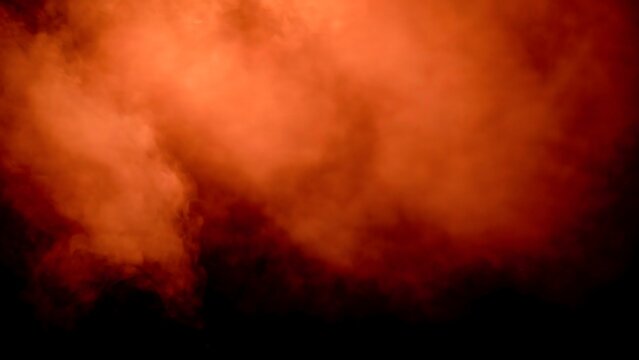 Orange smoke cloud with dark background