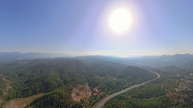 Aerial view of A8 motorway approaching Cannes through the Esterel Mountains, French Riviera