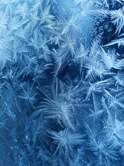 Obraz premium Close-up frost patterns on glass window with intricate ice crystals and winter Snowflake texture