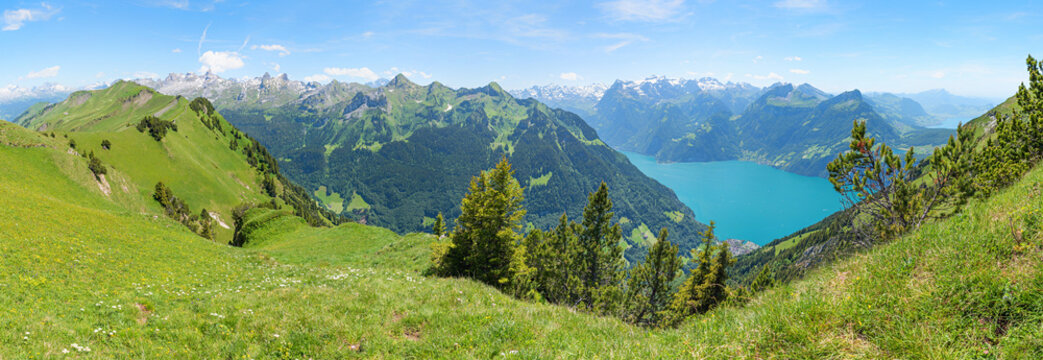 breathtaking view from ridge trail Fronalpstock to lake Lucerne and swiss alps.