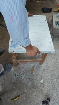 Testing Weight Capacity on Small Recycled Wooden Table
