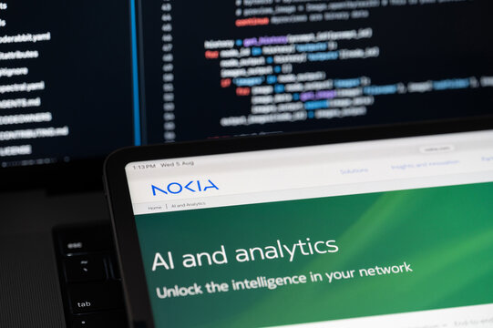 Nokia Ai company web page on program code background