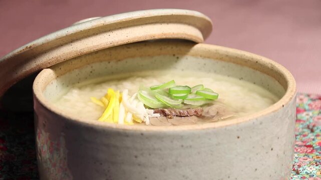 Korea gombang beef bone soup clear beef soup with rice spoon wooden spoon bowl traditional korean food Korea gomtang 한국 나주곰탕 곰탕 소고기 국밥 숟가락 밥 고기 대파 육수 국물 한식 식재료 전통