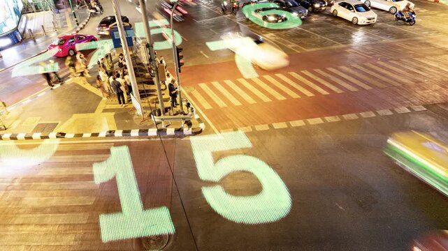 traffic in central bangkok with code and data overlayed in the buildings 