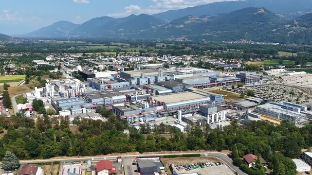Crolles, France &ndash; 1 August 2026: Aerial panoramic view of the STMicroelectronics semiconductor manufacturing complex surrounded by the French Alps, a major European site for microchip and silicon wafe