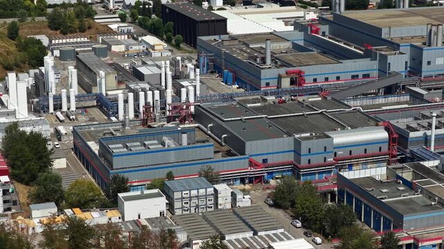 Crolles, France &ndash; 1 August 2026: Aerial close-up of industrial gas storage and utility infrastructure at the STMicroelectronics semiconductor manufacturing plant, supporting silicon wafer and chip pro