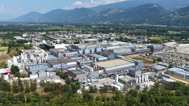 Crolles, France &ndash; 1 August 2026: Aerial panoramic view of the STMicroelectronics semiconductor manufacturing complex surrounded by the French Alps, a major European site for microchip and silicon wafe