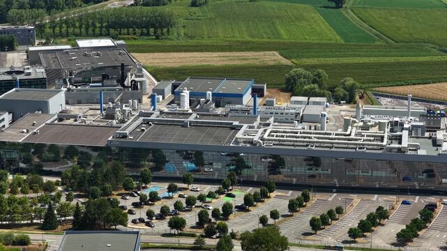 Bernin, France - August 1, 2026: Wide aerial view of Soitec semiconductor manufacturing complex producing advanced silicon wafers and materials for the global microelectronics industry