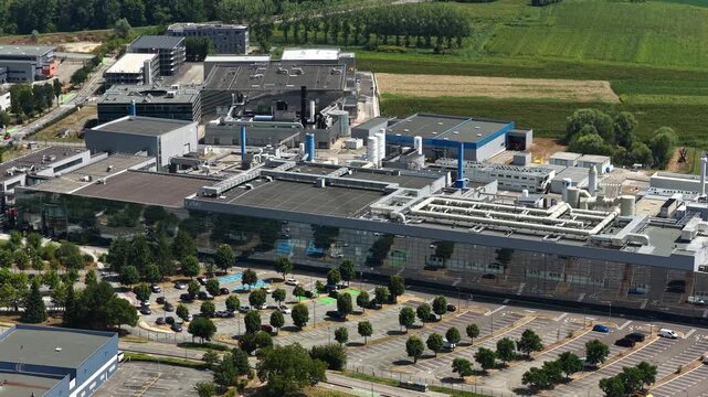 Bernin, France - August 1, 2026: Wide aerial view of Soitec semiconductor manufacturing complex producing advanced silicon wafers and materials for the global microelectronics industry
