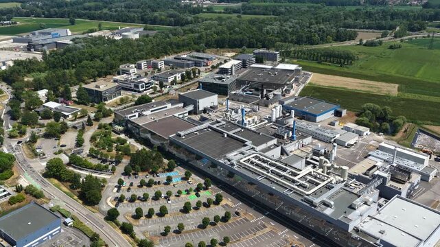 Bernin, France - August 1, 2026: Wide aerial view of Soitec semiconductor manufacturing complex producing advanced silicon wafers and materials for the global microelectronics industry