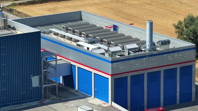 Crolles, France &ndash; 1 August 2026: Drone view of industrial rooftop cooling infrastructure at the STMicroelectronics semiconductor fabrication facility, a major European microelectronics and silicon waf