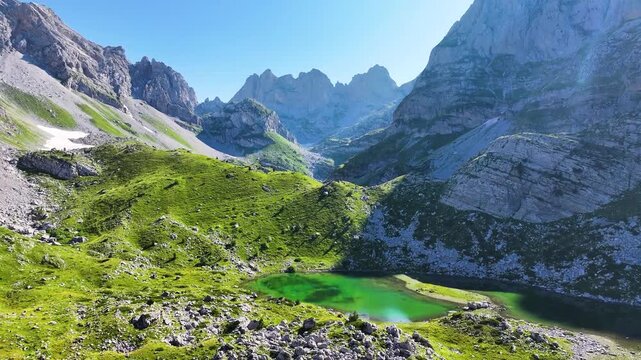Albanian alps Jezerca lakes morning light in clear sky