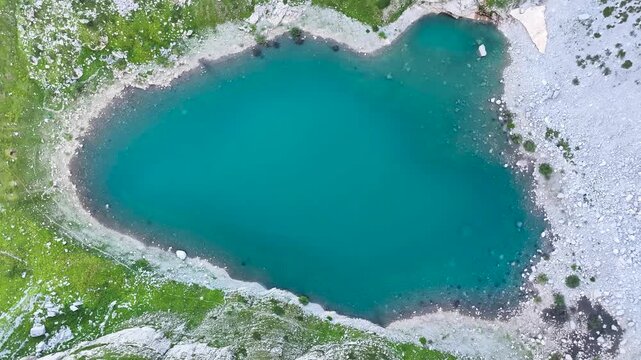 Albanian alps Jezerca lakes morning light in clear sky