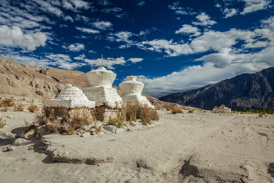 A whitewashed chortens (Tibetan Buddhism stupa) in Himalayas. Nubra valley, Ladakh, India