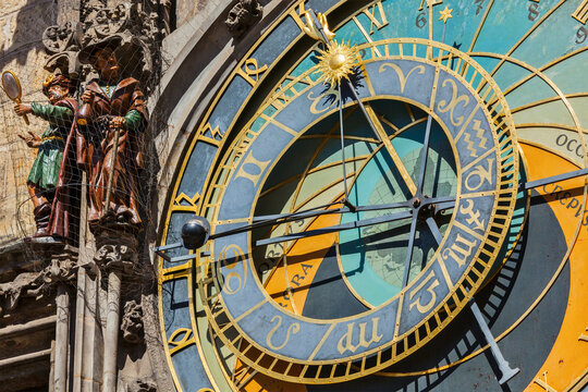 Scene featuring astronomical clock on Town Hall. Prague, Czech Republic